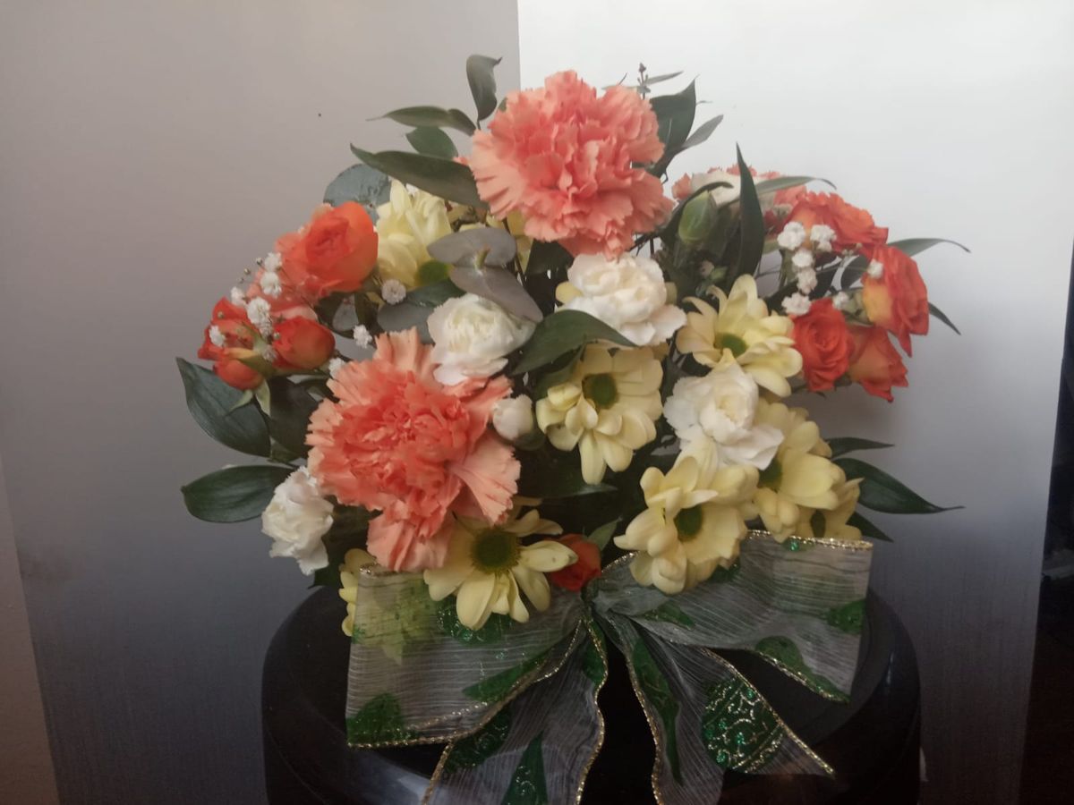 Peach & cream arrangement by Wright Stripes Floristry