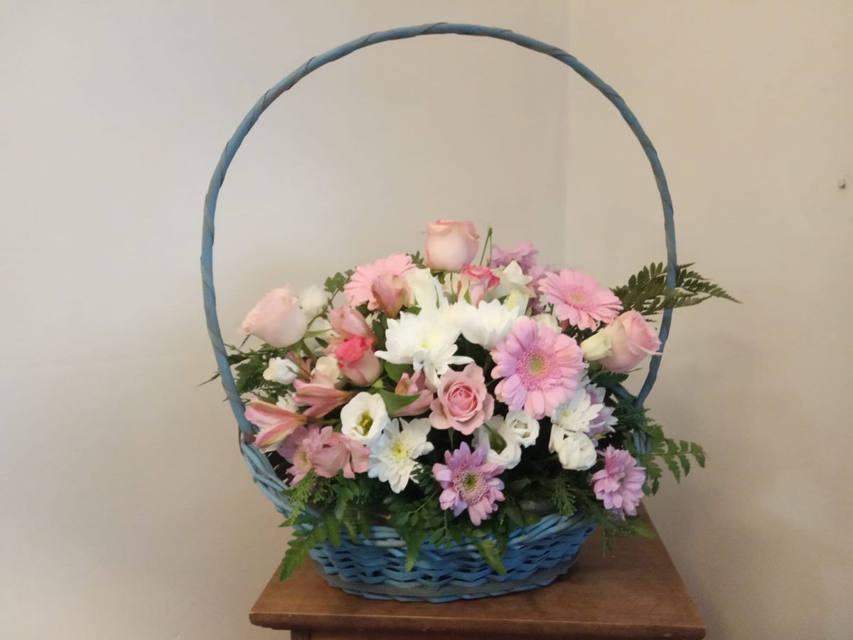 Pink & white basket by Wright Stripes Floristry