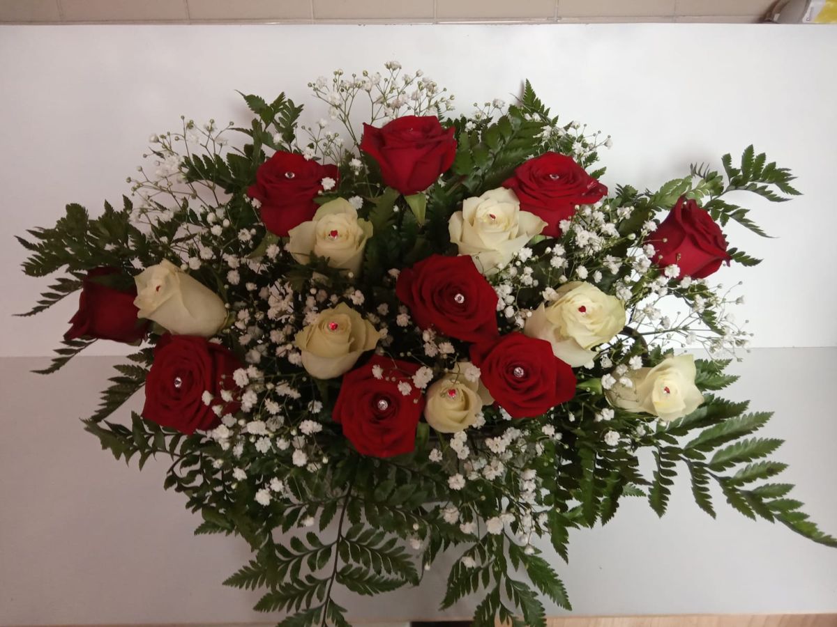 Red & white roses by Wright Stripes Floristry