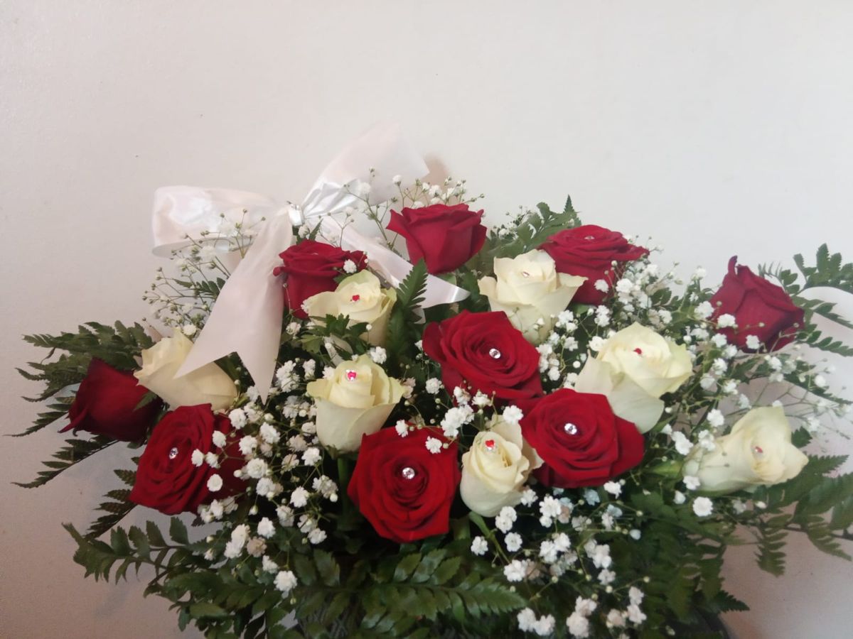 Mixed rose arrangement by Wright Stripes Floristry