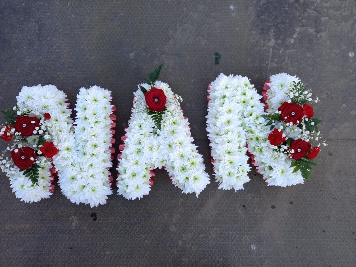 Nan tribute by Wright Stripes Floristry