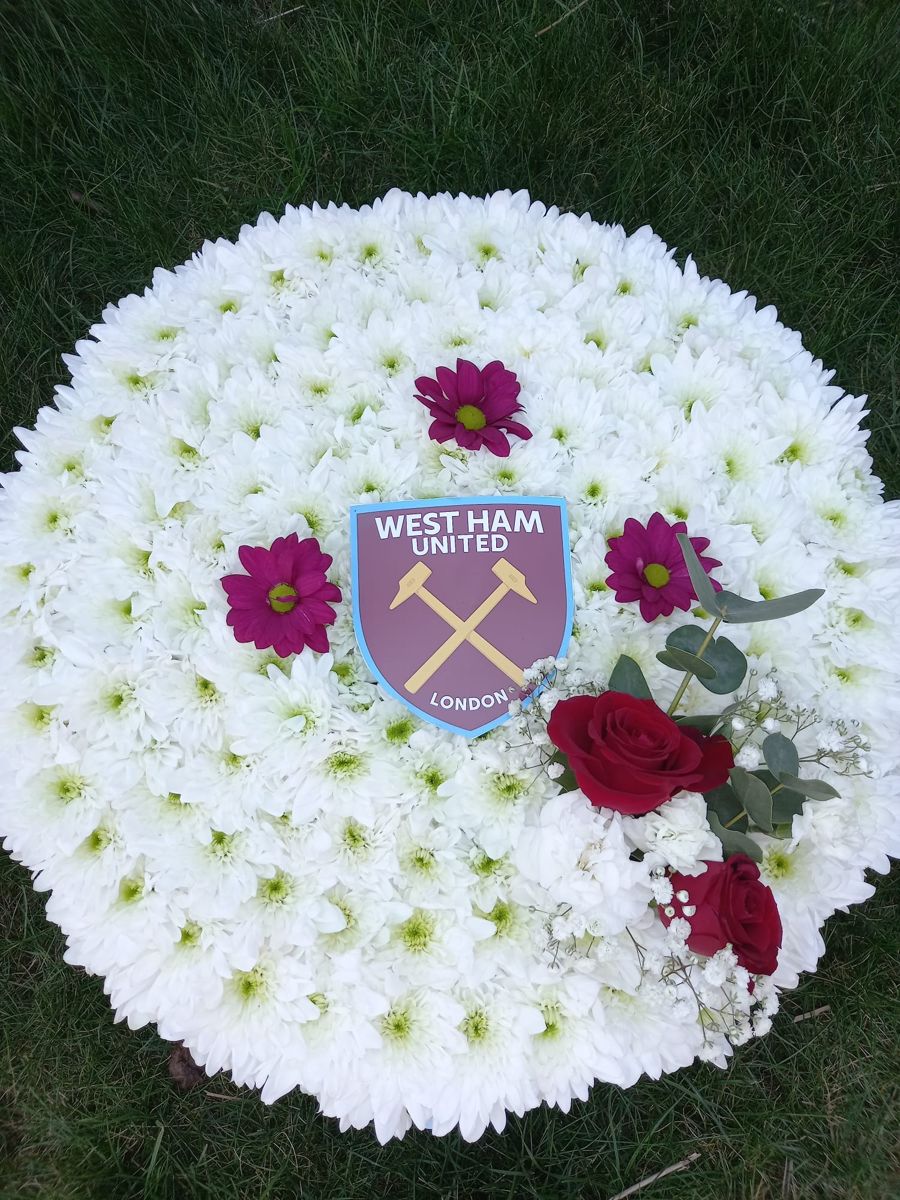 Bespoke club tribute by Wright Stripes Floristry